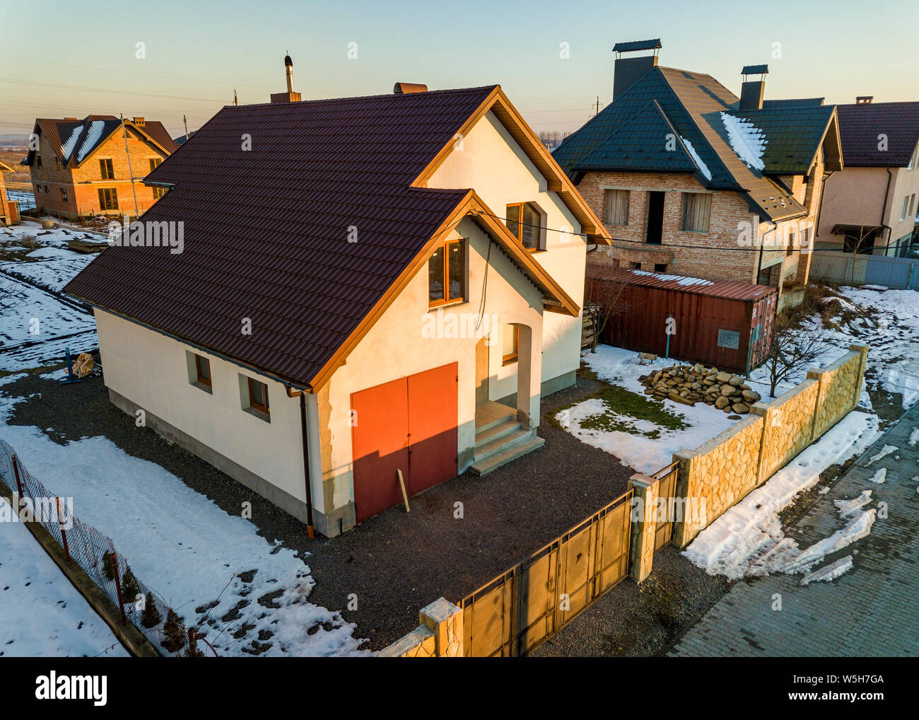 Aerial View Of New Residential House Cottage And Attached Garage