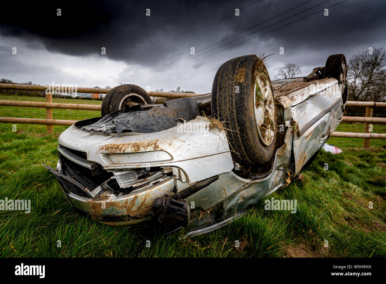 Car crash. Young drivers overturned vehicle. Non fatal accident caused