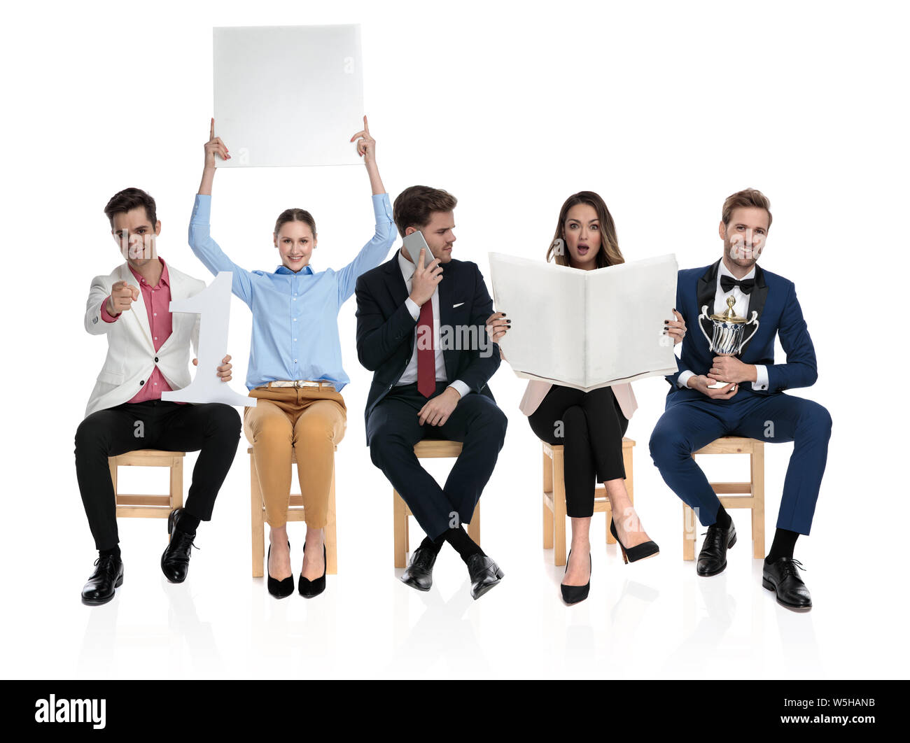 group of seated people doing different things, isolated on white background Stock Photo