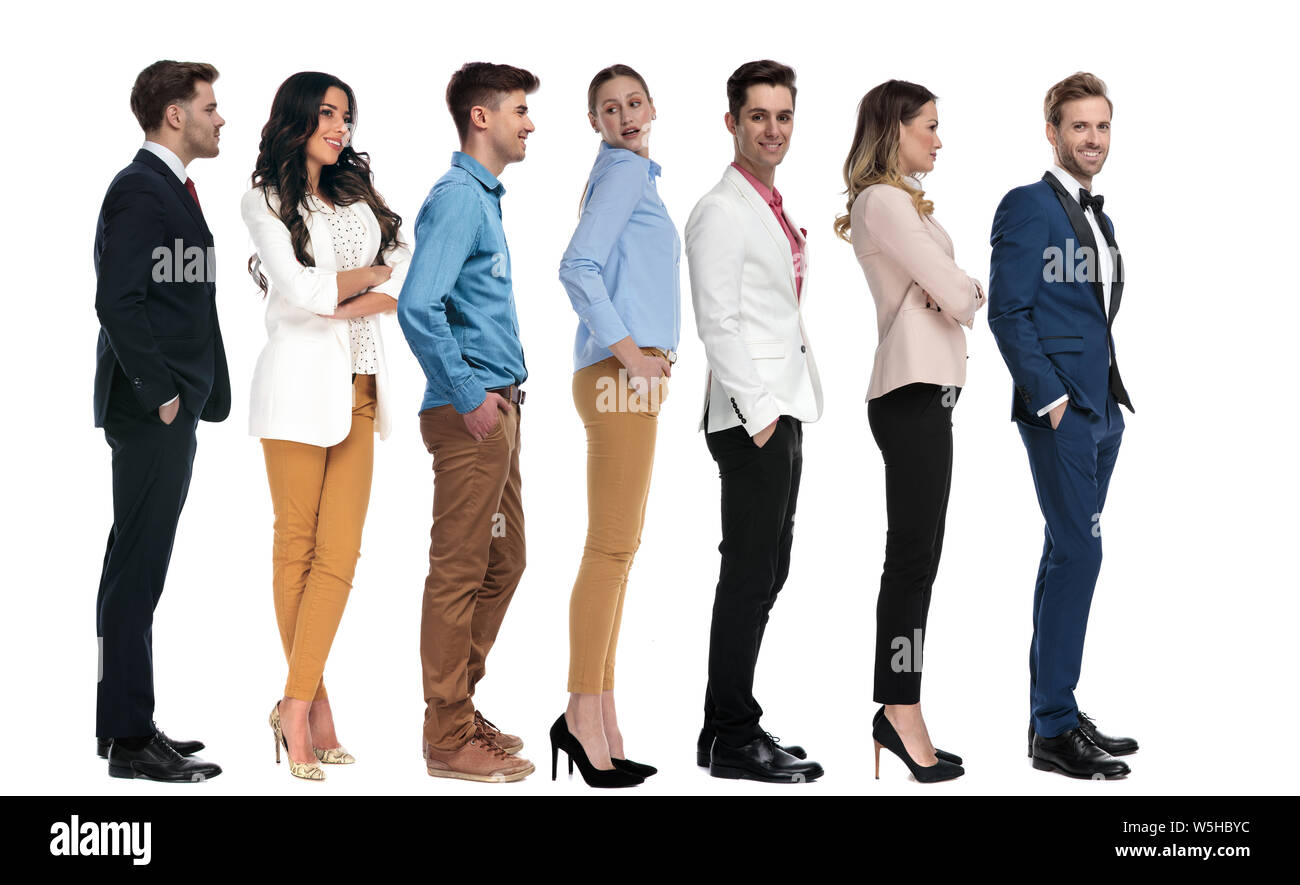line of casual and elegant young people, on white background Stock Photo -  Alamy
