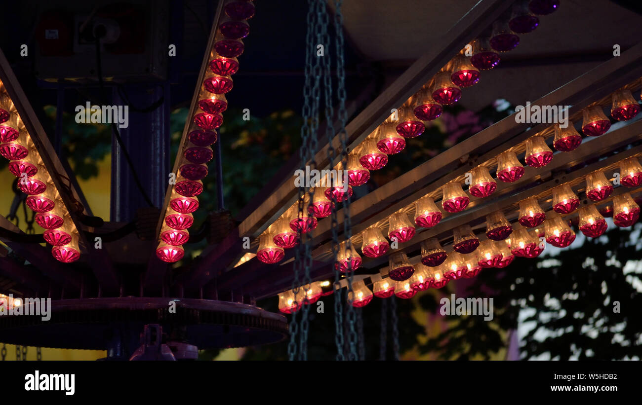 Pink Park Rides Pink lights on an amusement park ride Stock Photo - Alamy