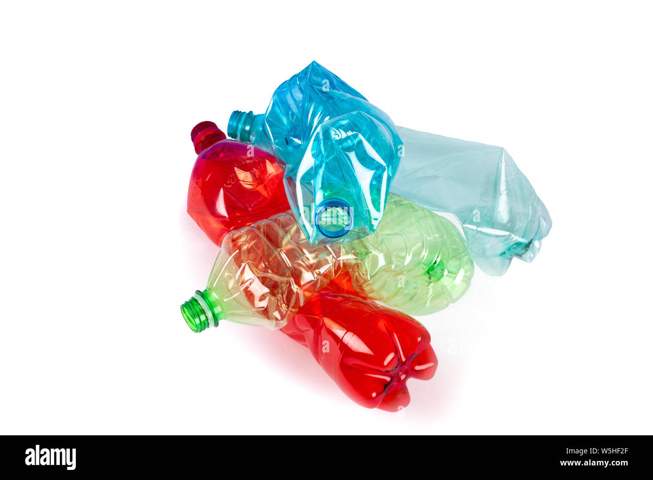 Crushed plastic bottles isolated on  white background Stock Photo