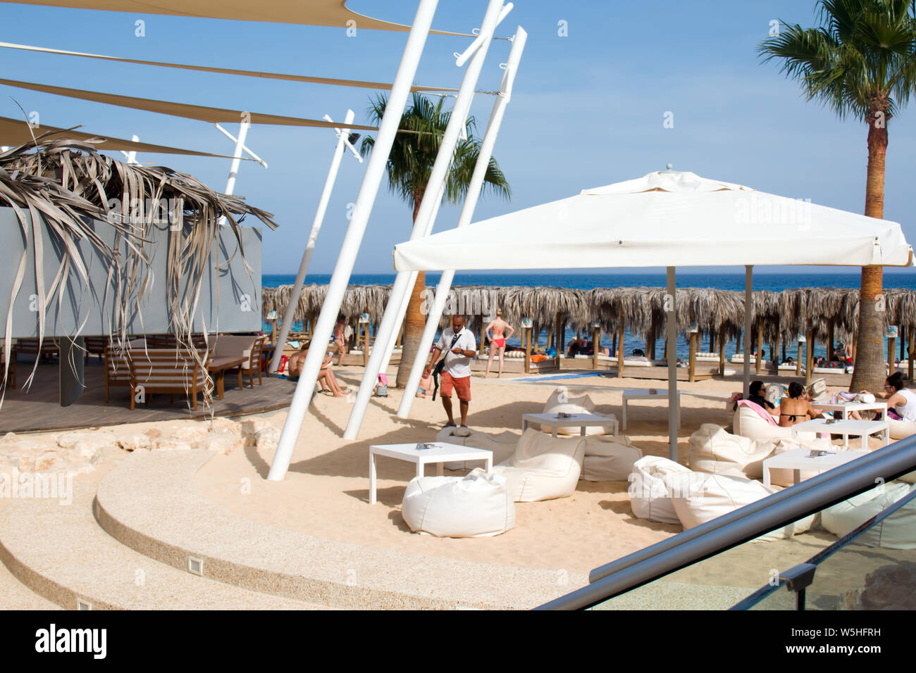 Summer outdoor terrace cafe on sand beach Stock Photo