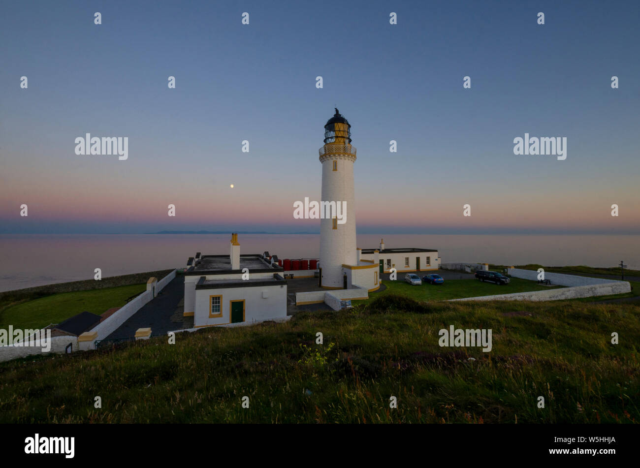 Dusk landscape of the lighthouse at the Mull of Galloway Dumfries and Galloway Scotland UK Stock Photo