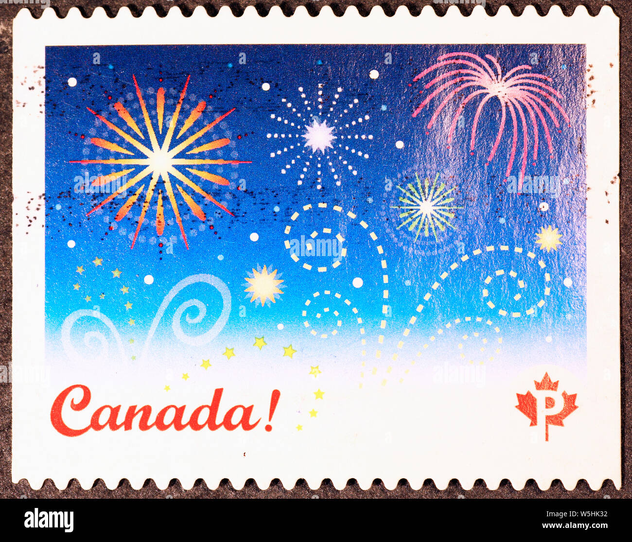 Fireworks on canadian postage stamp Stock Photo