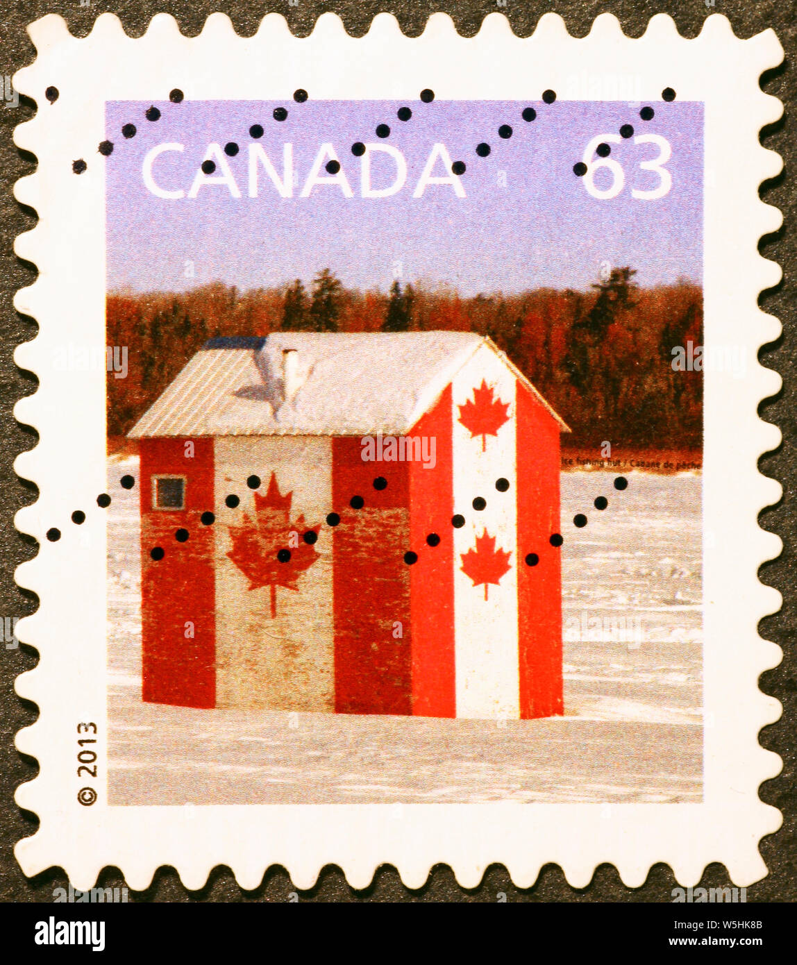 Hut painted as canadian flag on postage stamp Stock Photo Alamy