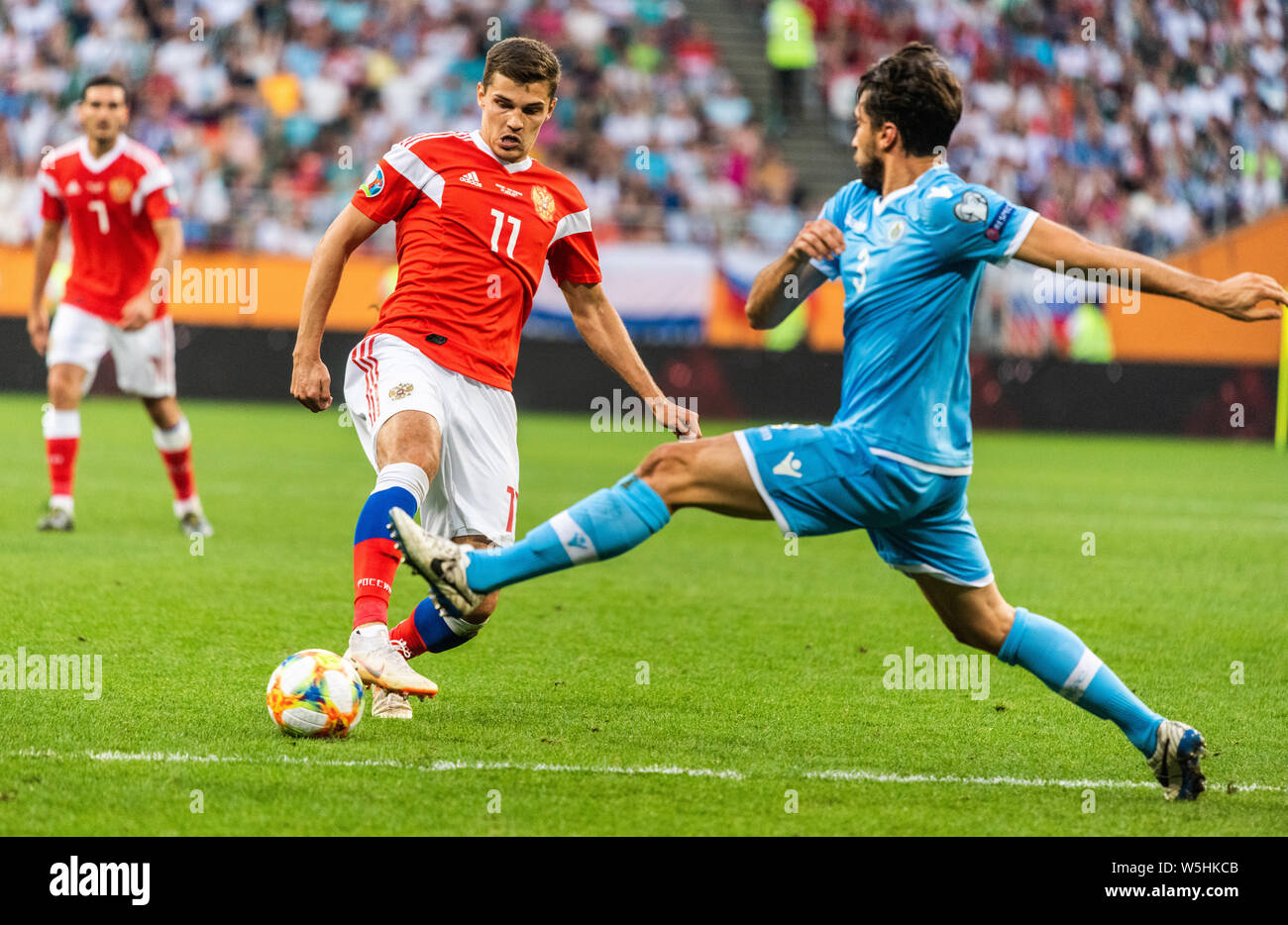 Saransk, Russia - June 8, 2019. Russia national team midfielder Roman Zobnin against San Marino national team midfielder Mirko Palazzi during UEFA Eur Stock Photo