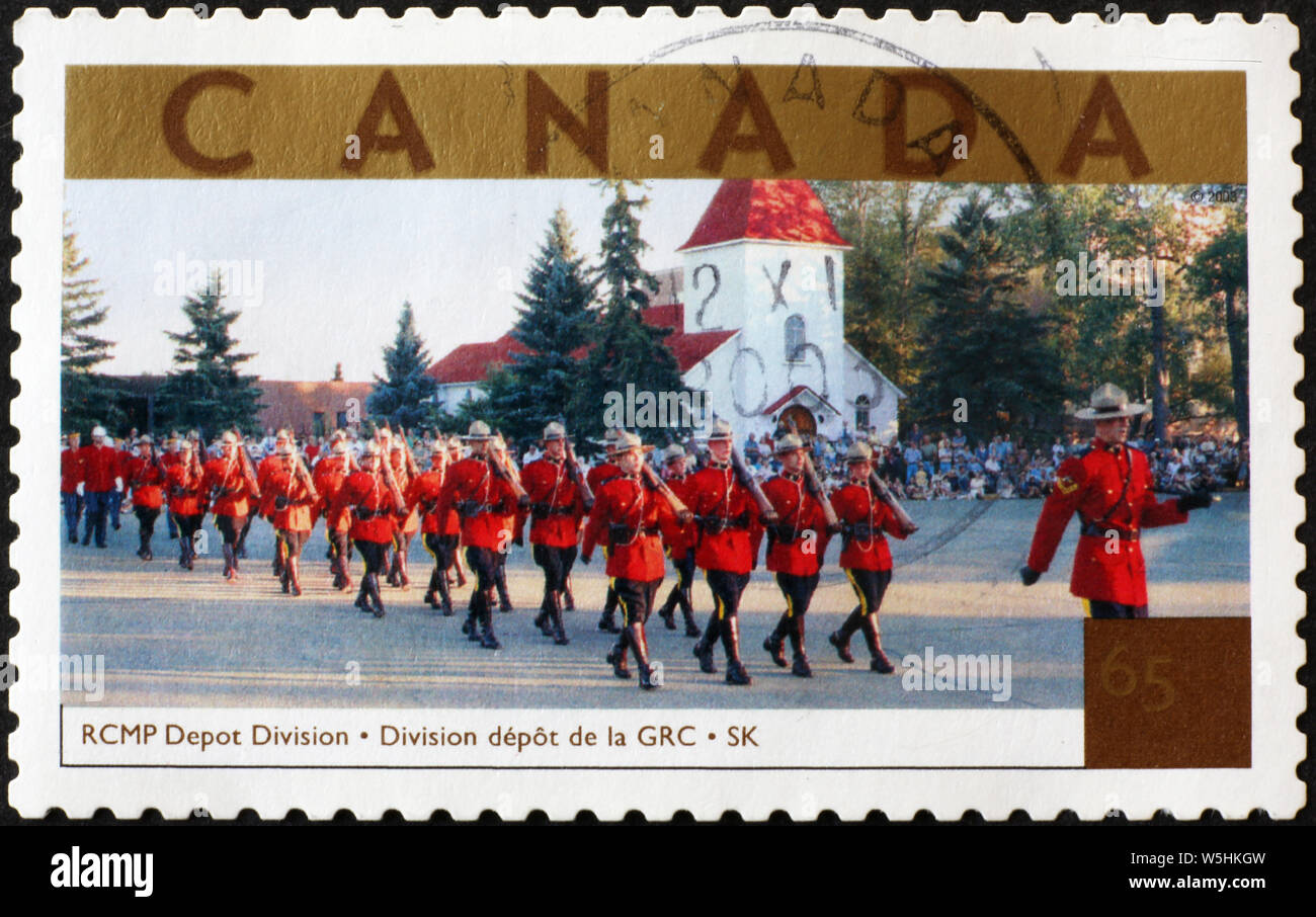 Parade of Royal canadian mounted policeman on stamp Stock Photo