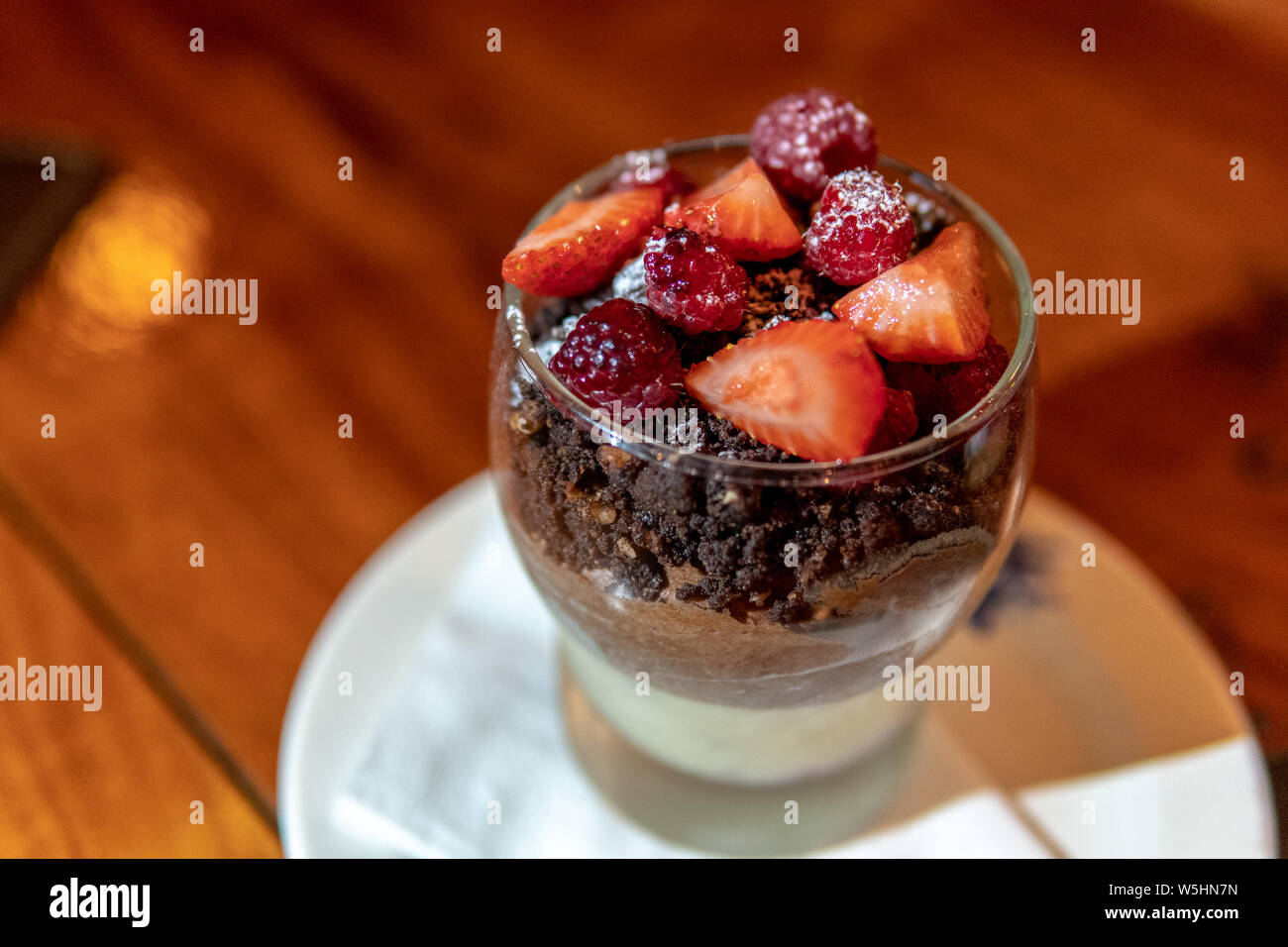 strawberry with chocolate and vanila pudding in glass cup Stock Photo