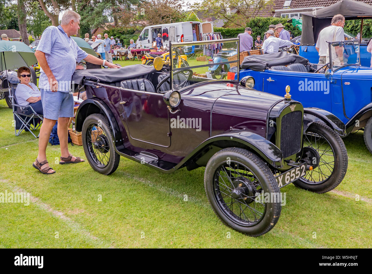 Man Admiring A Veteran Open Top Car On Display At The Annual Classic And Vintage Car Show Held At Wroxham Norfolk Uk Stock Photo Alamy