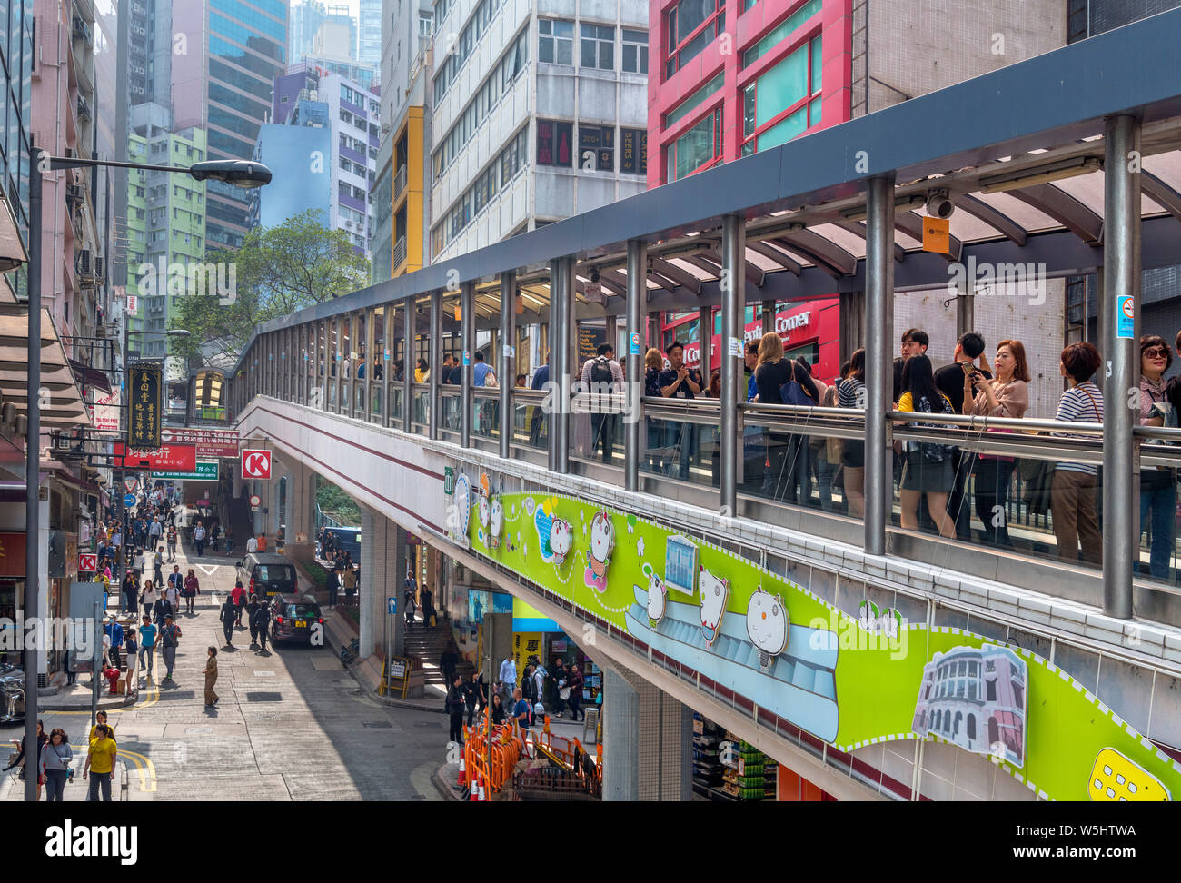 Bottom of the Central–Mid-Levels Escalator at Queen's Road, Central district, Hong Kong Island, Hong Kong, China Stock Photo