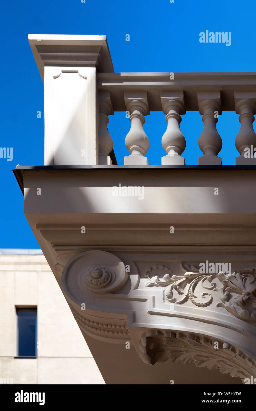 Clean Balcony With Columns Of An Old Renovated House On A Background Of Blue Sky In Summer Stock Photo Alamy