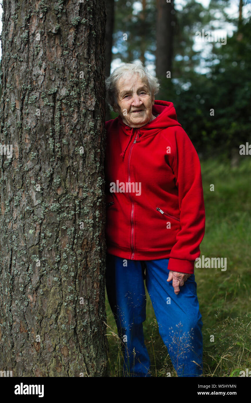 Elderly lonely woman walks hi-res stock photography and images - Alamy