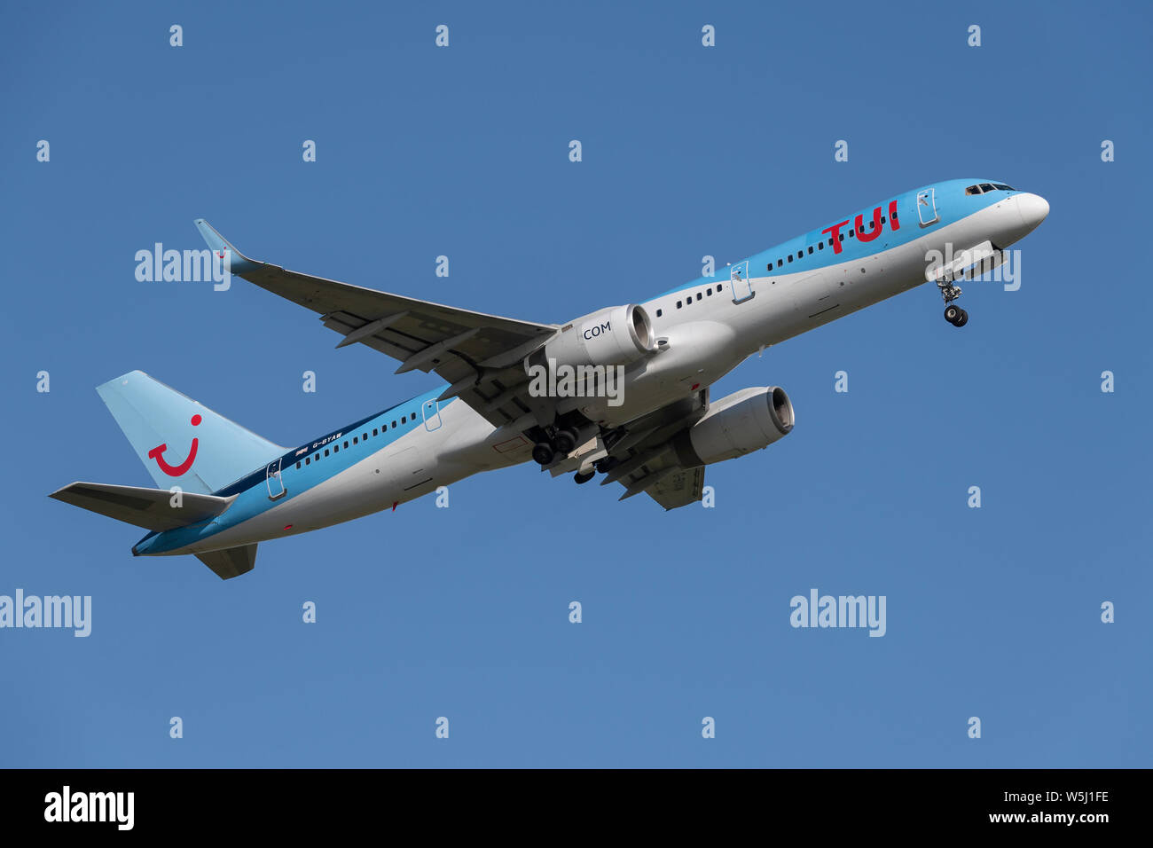 A TUI Airways Boeing 757-200 takes off from Manchester International Airport (Editorial use only) Stock Photo