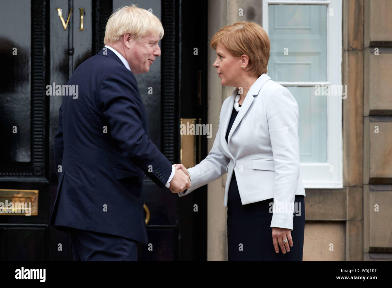 Edinburgh, Scotland. UK. 29 July 2019. British Prime Minister Boris Johnson and  First Minister of Scotland Nicola Sturgeon outside Bute House, Edinburgh Credit: Andrew Eaton/Alamy Live News Stock Photo