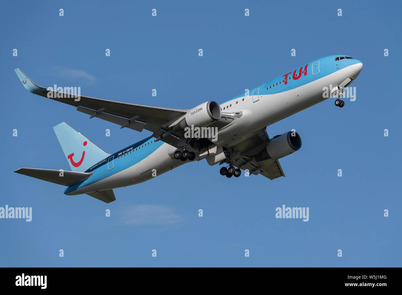 A TUI Airways Boeing 767-300 takes off from Manchester International Airport (Editorial use only) Stock Photo