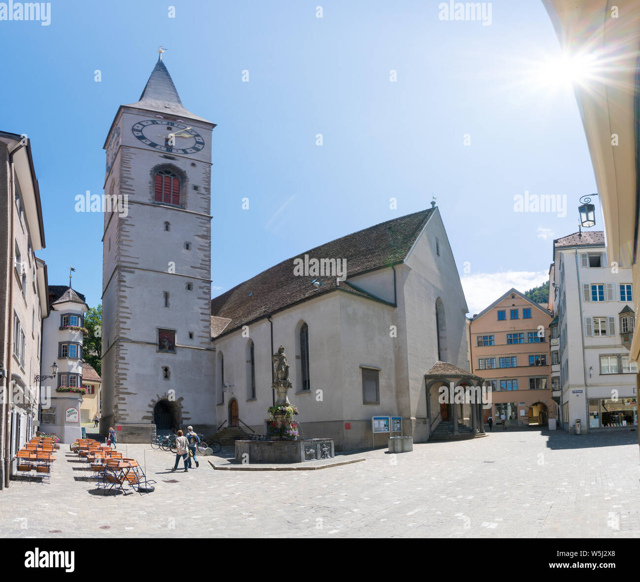 Chur, GR / Switzerland - 29. July 2019: the St. Martin church and square in the historic old town of Chur in Switzerland Stock Photo