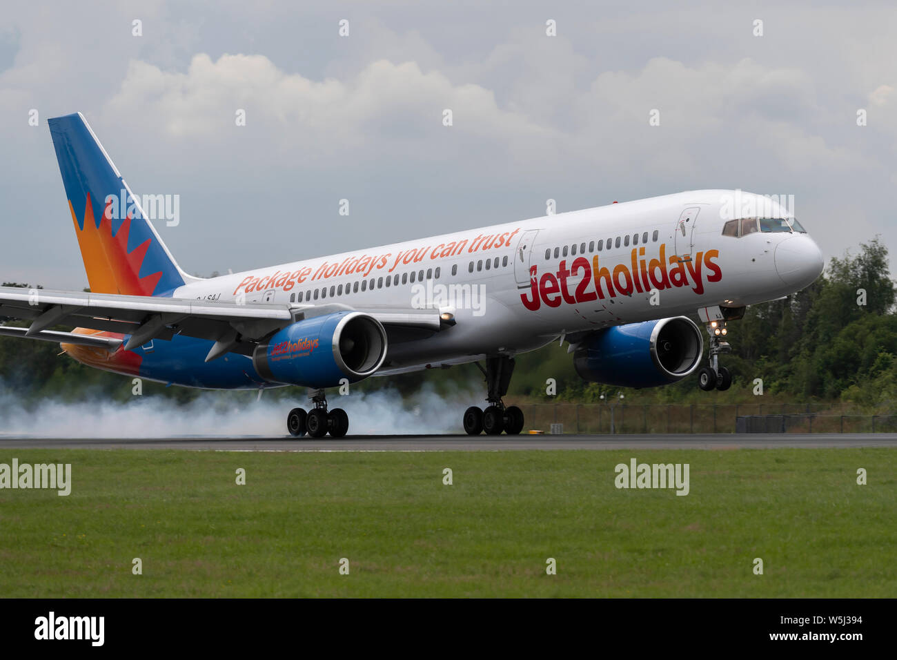 A Jet2 Boeing 757-200 lands at Manchester International Airport (Editorial use only) Stock Photo
