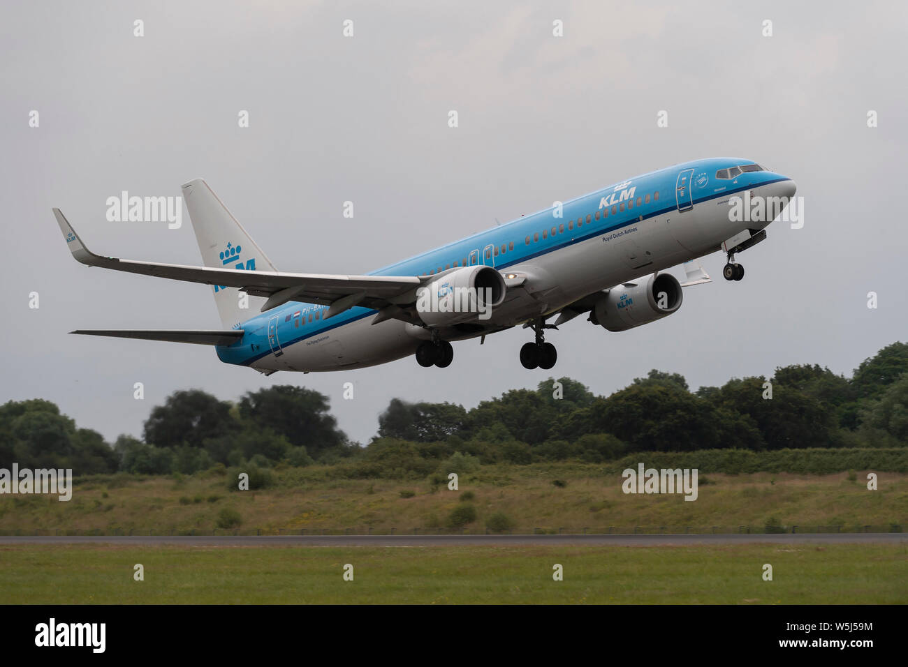 A KLM Boeing 737-800 takes off from Manchester International Airport (Editorial use only) Stock Photo