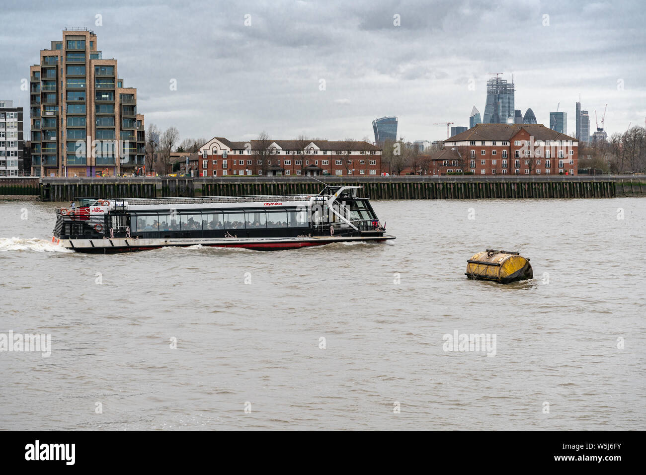 London, UK - March 05, 2019: Tourist boat on River Thames London England Uk Stock Photo