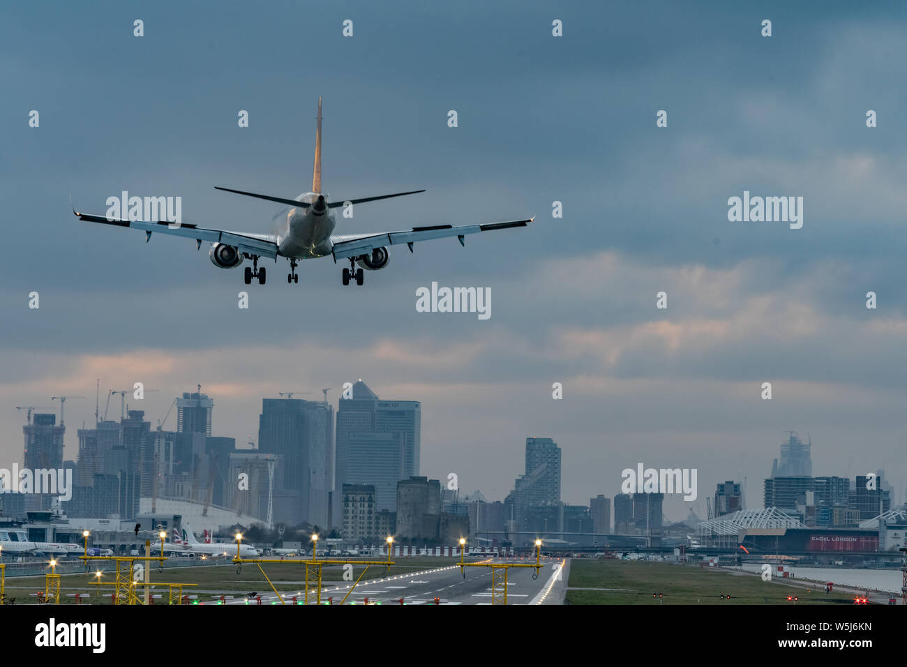 London, UK - 17, February 2019: Embraer E-Jet family series of narrow-body short to medium range twin-engine jet airliner landing at the London City A Stock Photo