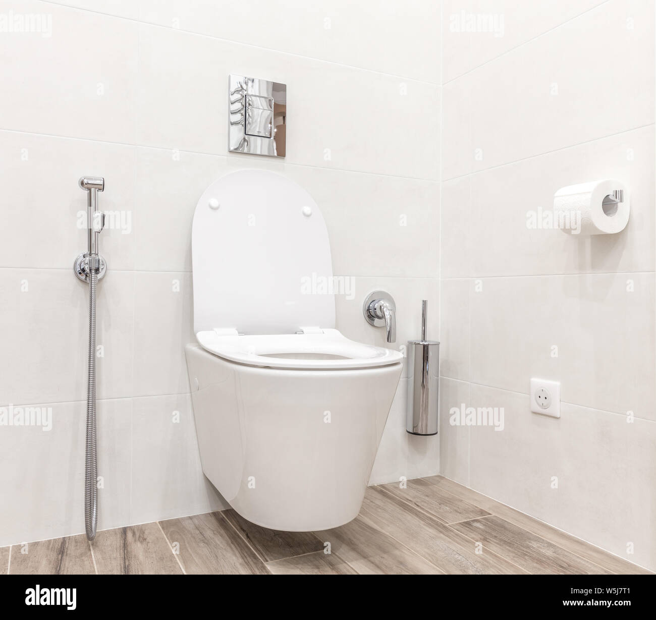 Toilet bowl in modern white style bathroom Stock Photo - Alamy