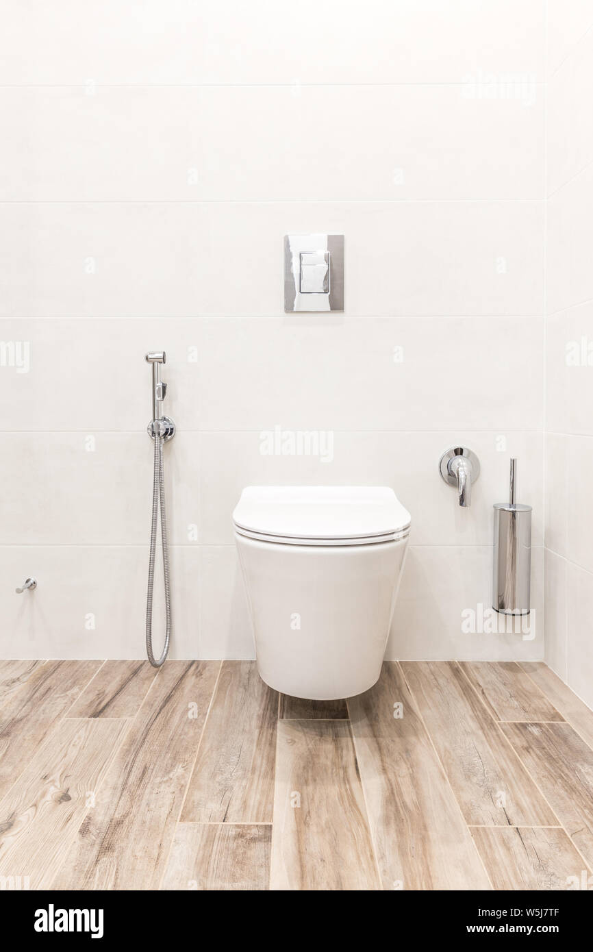 Toilet bowl in modern white style bathroom Stock Photo - Alamy