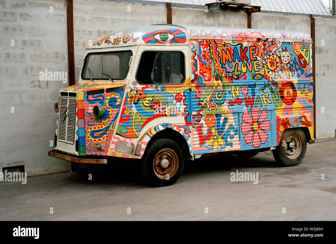 Psychedelic Make Love Not War Van. Retro Nineteen Sixties History Historical Stock Photo