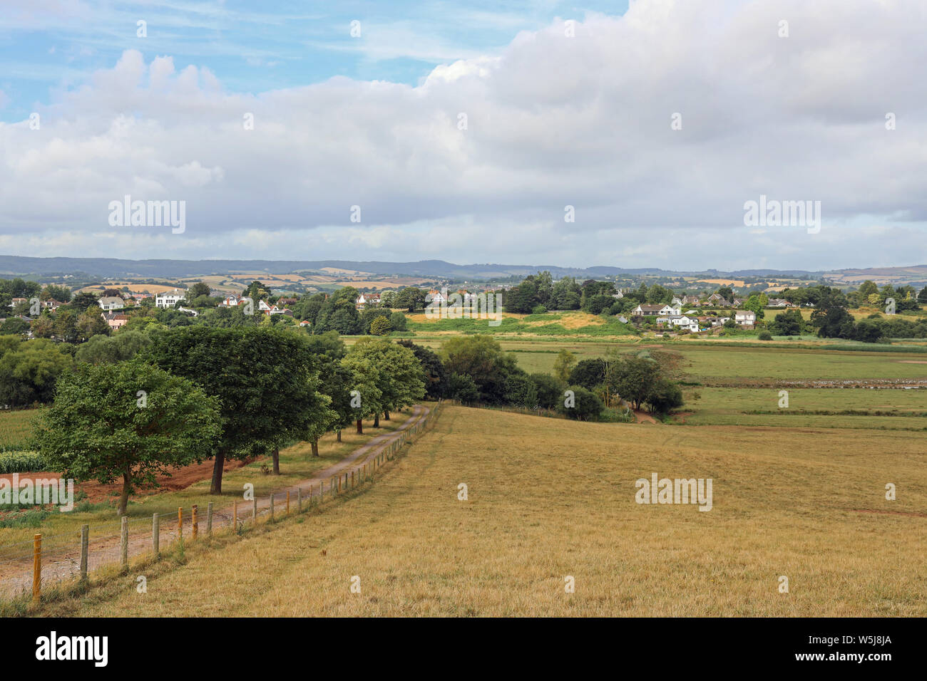 Farming, wetlands and housing in an idylic setting near Darts Farm complex near Topsham in Devon Stock Photo
