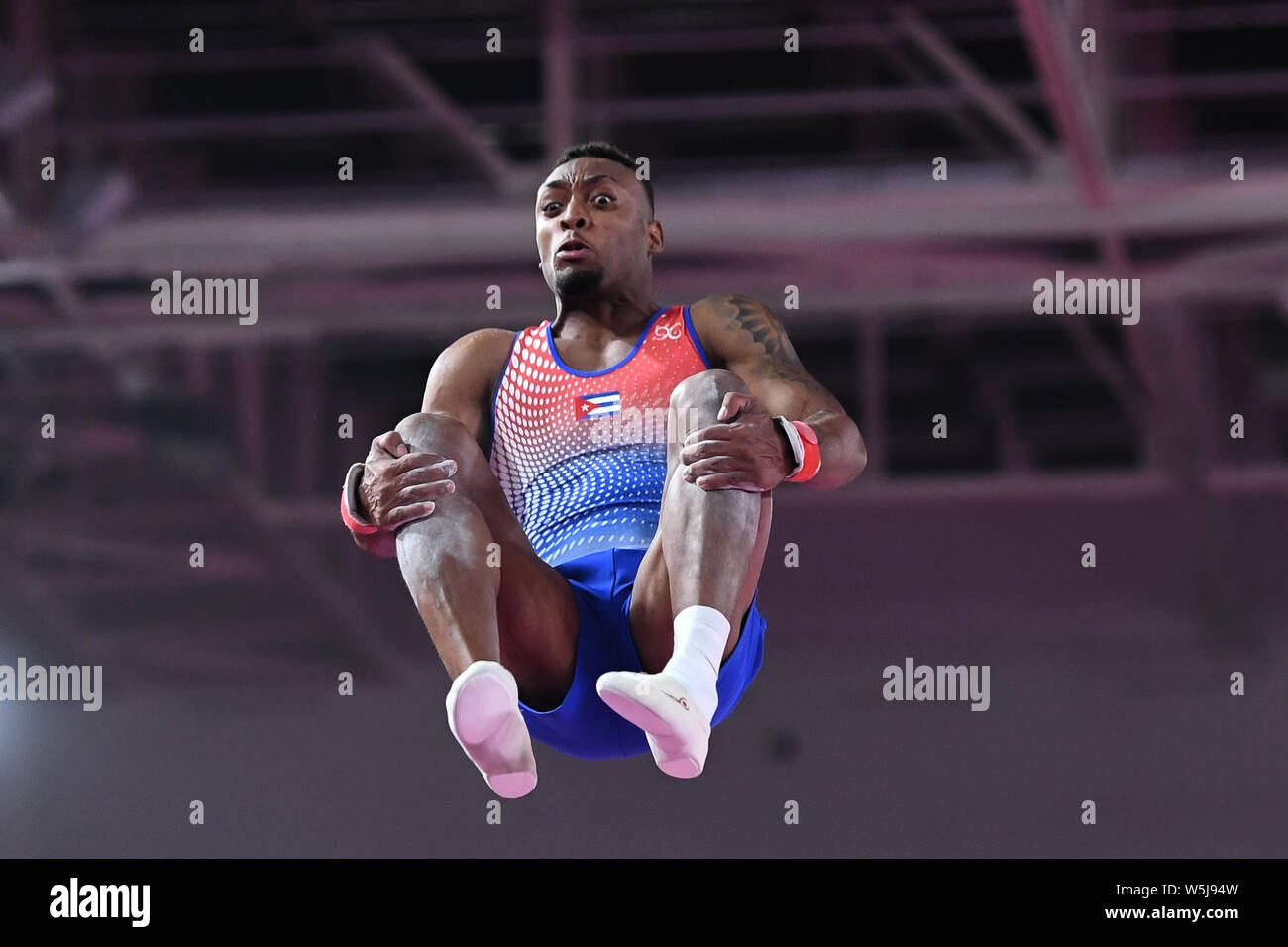 July 28, 2019, Lima, Peru: RANDY LERU from Cuba competes on the floor exercise during the team finals competition held in the Polideportivo Villa El Salvador in Lima, Peru. Credit: Amy Sanderson/ZUMA Wire/Alamy Live News Stock Photo