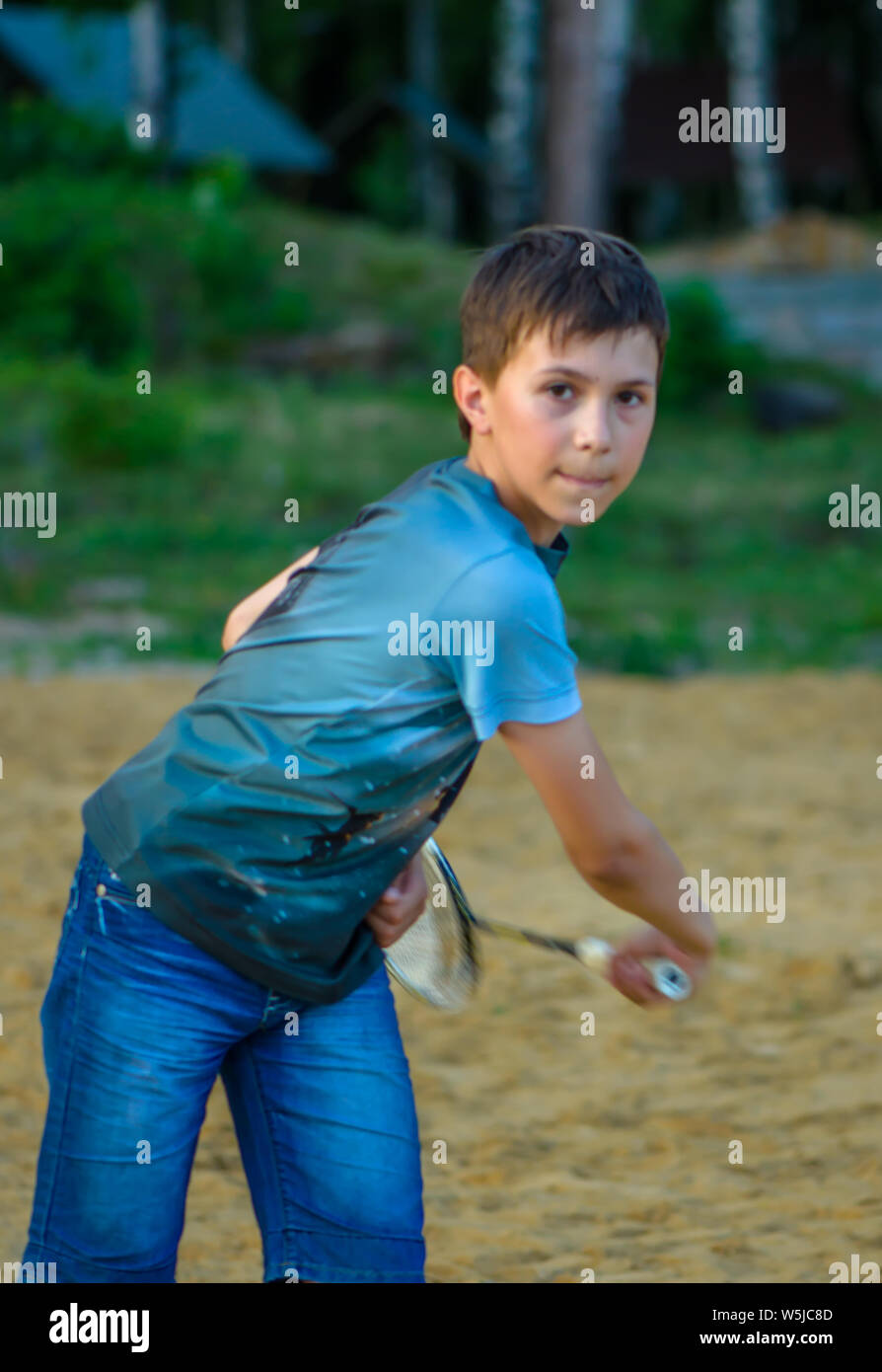 the boy with the racket from badmindton Stock Photo - Alamy