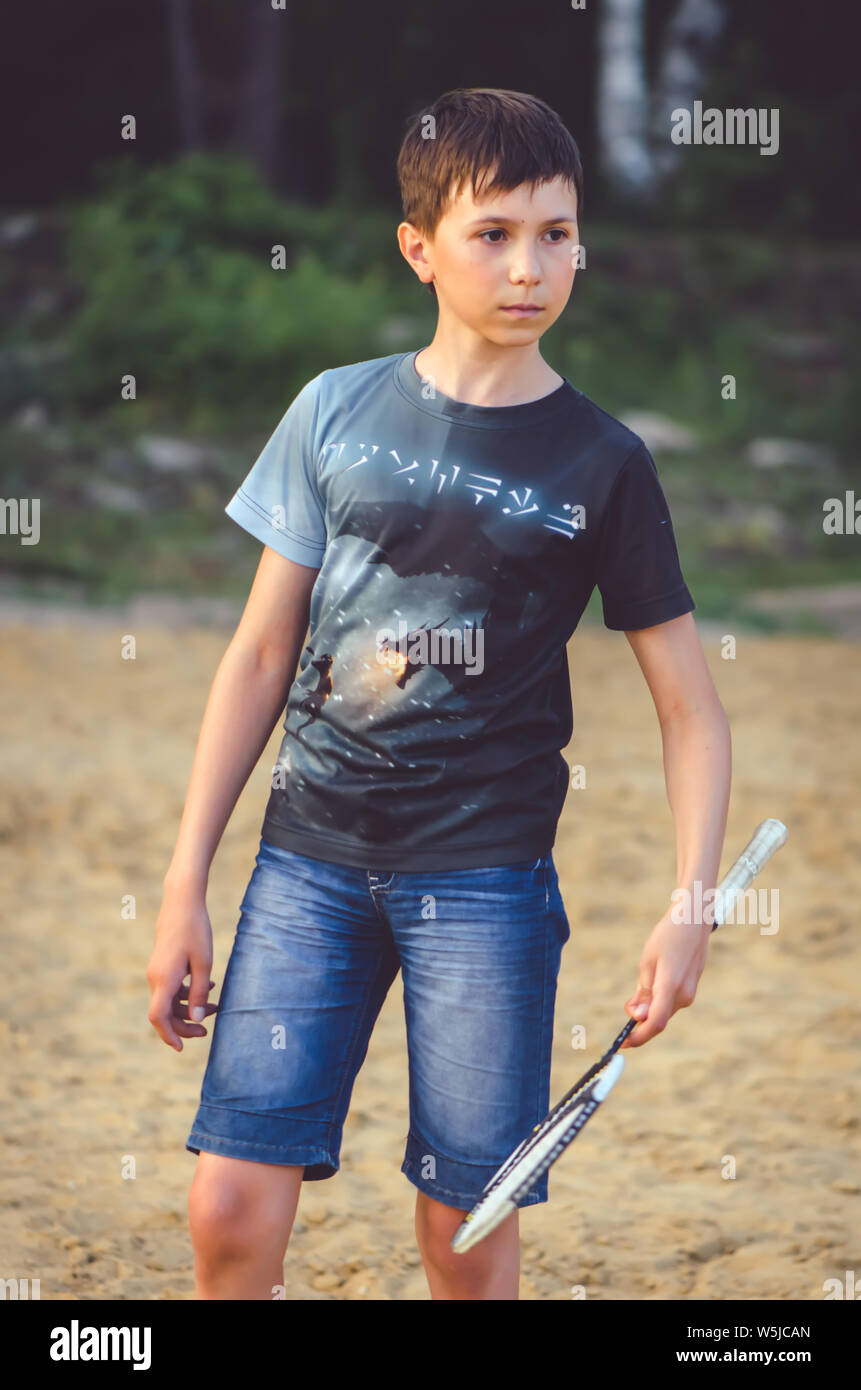 the boy with the racket from badmindton Stock Photo - Alamy