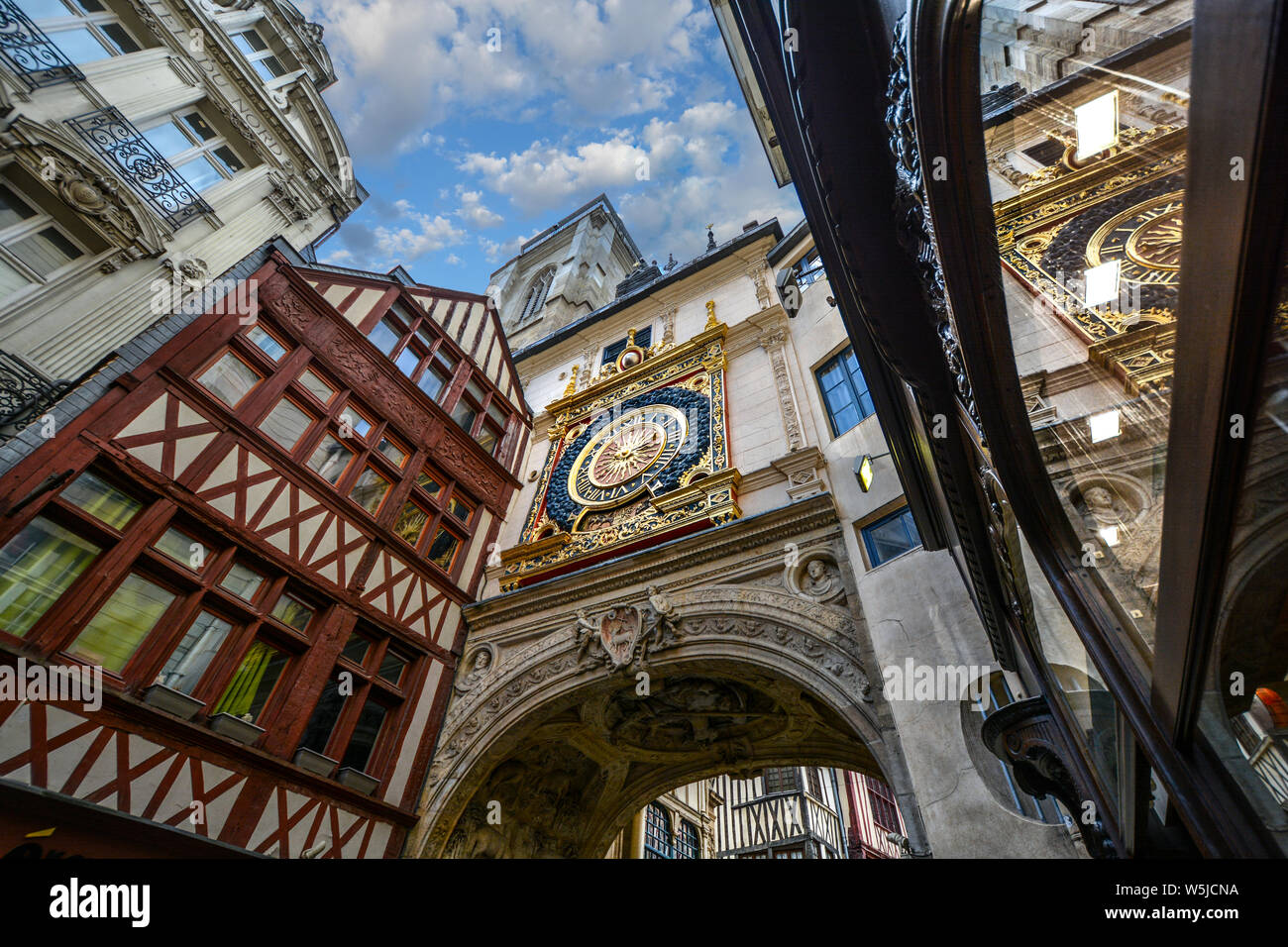 The astronomical clock on the Rue du Gros Horloge in the historic city ...