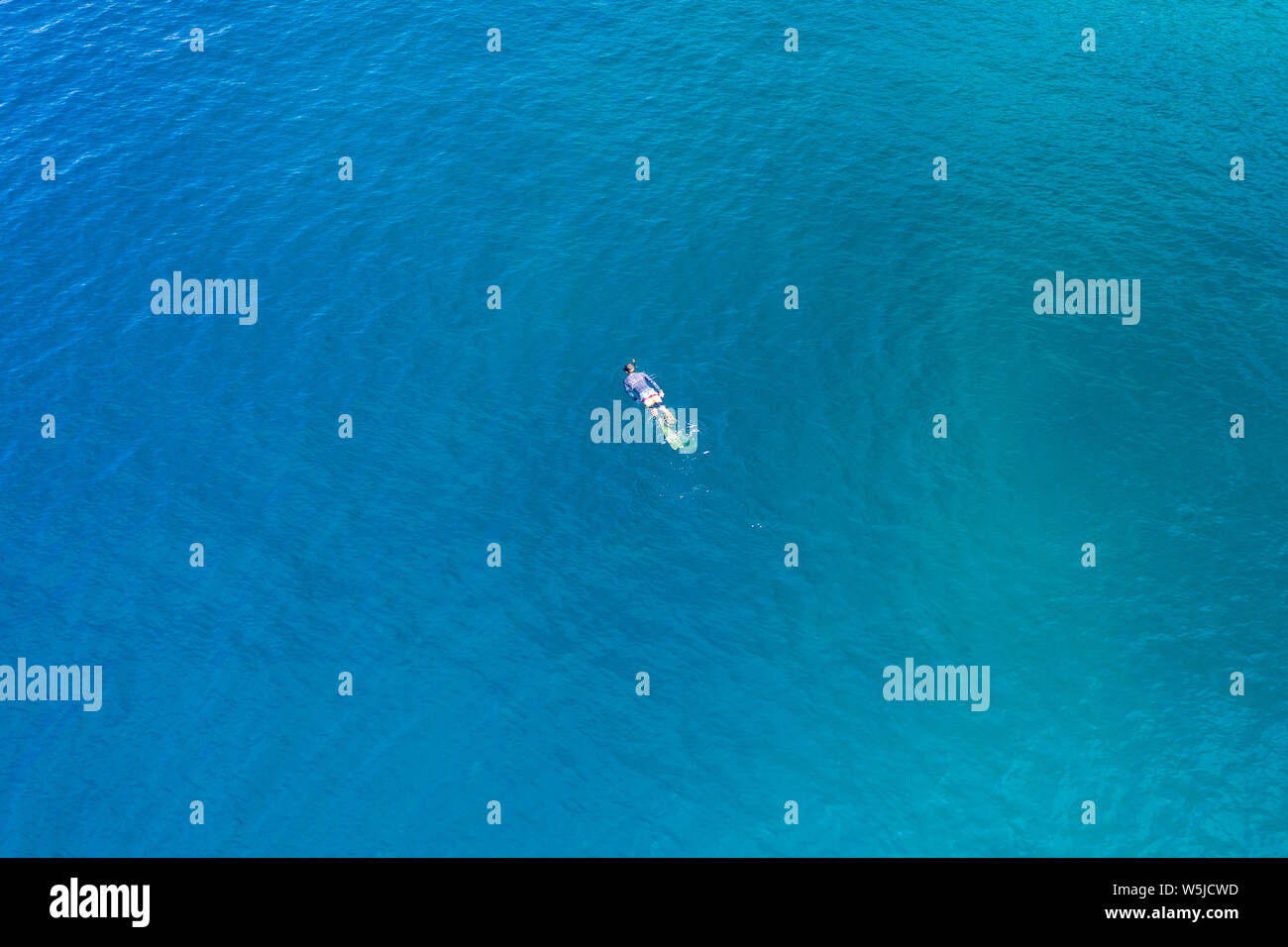Snorkeler and tropical island hi-res stock photography and images - Alamy