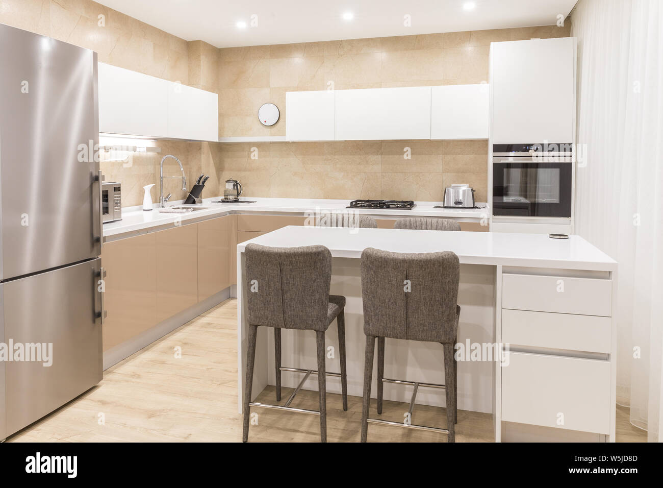 Modern white Kitchen Counter and Kitchen Equipment in Luxurious Apartment.  small kitchen counter ideas in the residential Stock Photo - Alamy