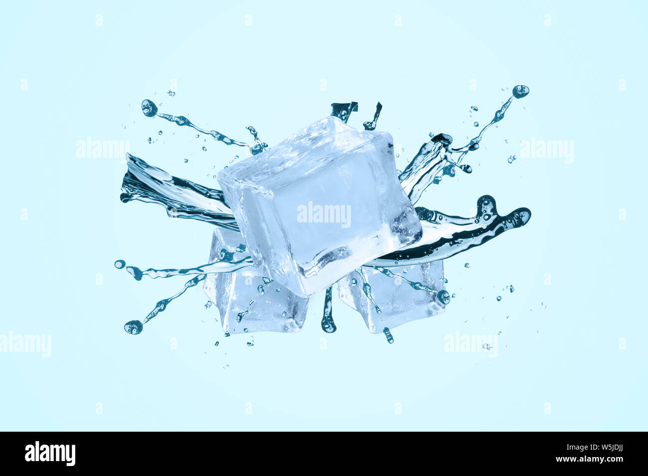 Water splash with ice cubes over blue background Stock Photo - Alamy
