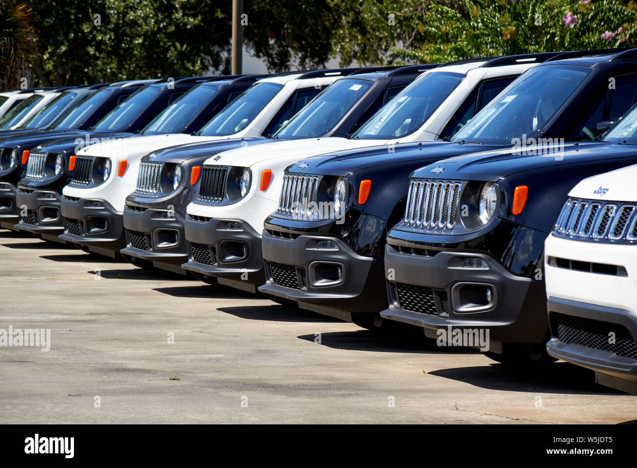 new jeep suvs for sale vehicles on a car sales lot in florida usa united states of america Stock Photo