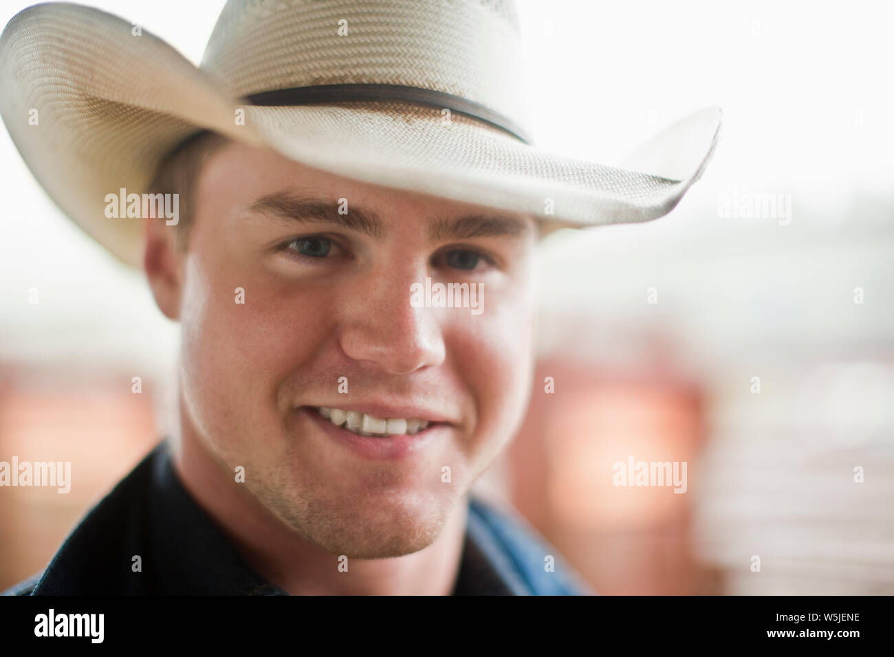 Portrait of young adult cowboy. Stock Photo