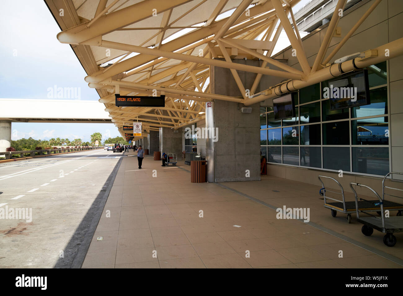 kerbside outside Orlando International airport MCO terminal florida usa united states of america Stock Photo