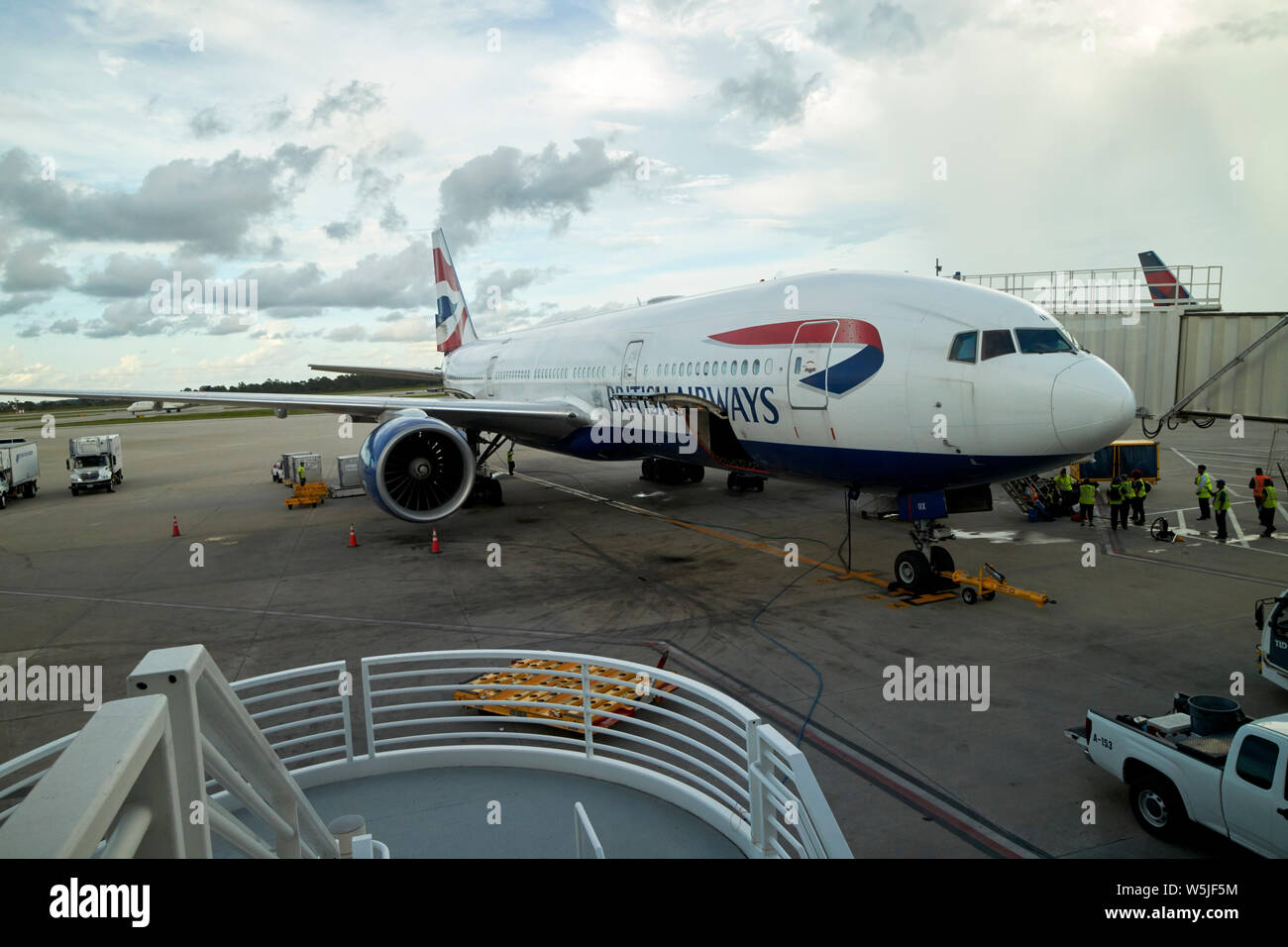 British Airways boeing 777 G-VIIX airside on stand at Orlando International airport MCO terminal florida usa united states of america Stock Photo