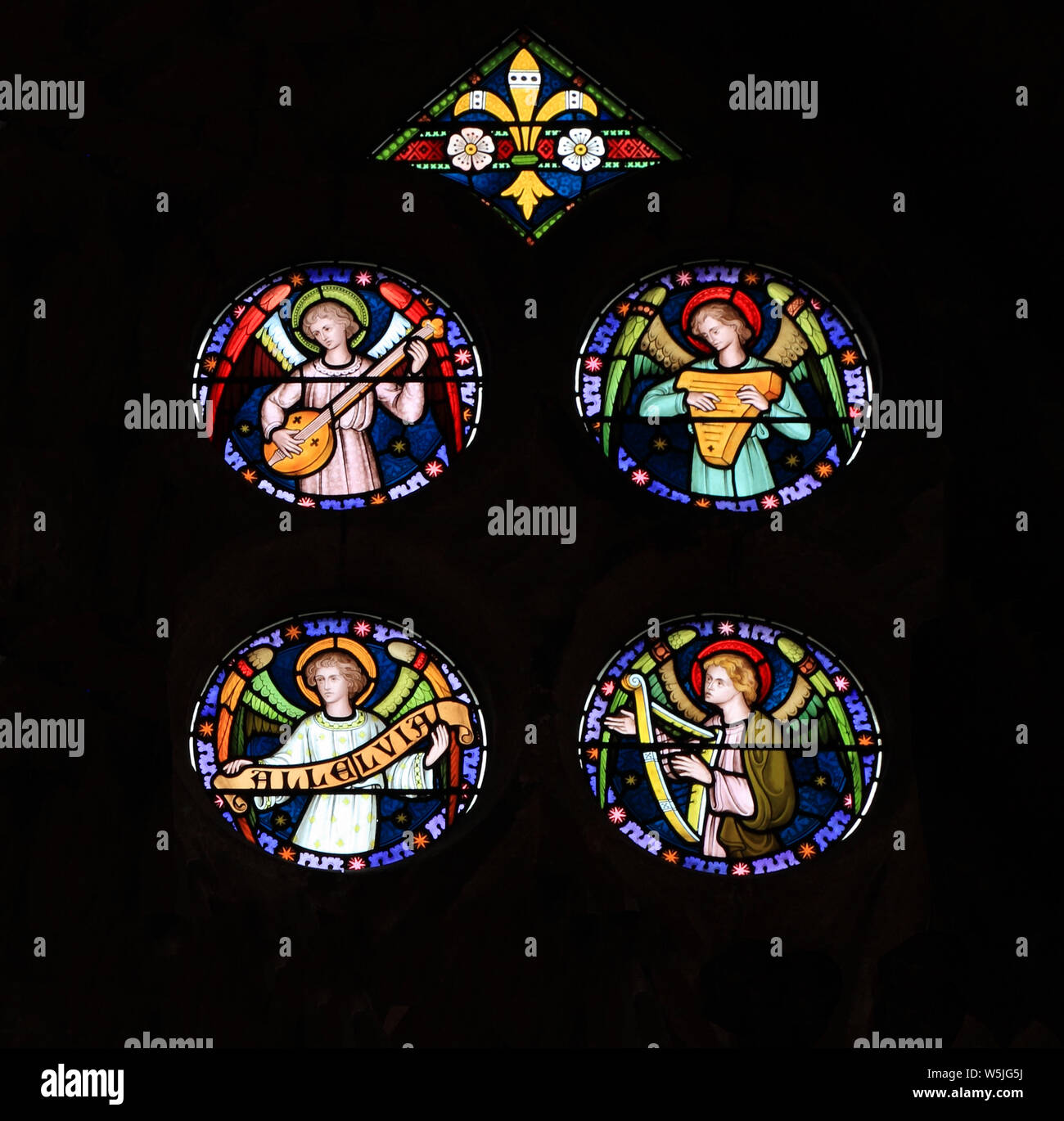 Angel Musicians, stained glass window, by Frederick Preedy, 19th century, angels, musical instruments, music, Old Hunstanton, Norfolk, England Stock Photo