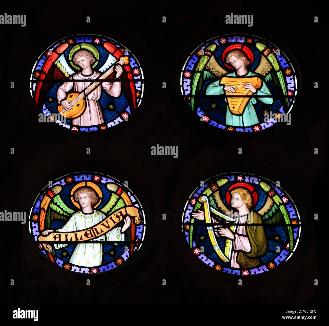 Angel Musicians, stained glass window, by Frederick Preedy, 19th century, angels, musical instruments, music, Old Hunstanton, Norfolk, England Stock Photo