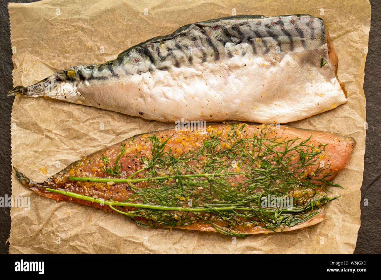 Whole raw mackerel fillets that have been used to make gravlax, or