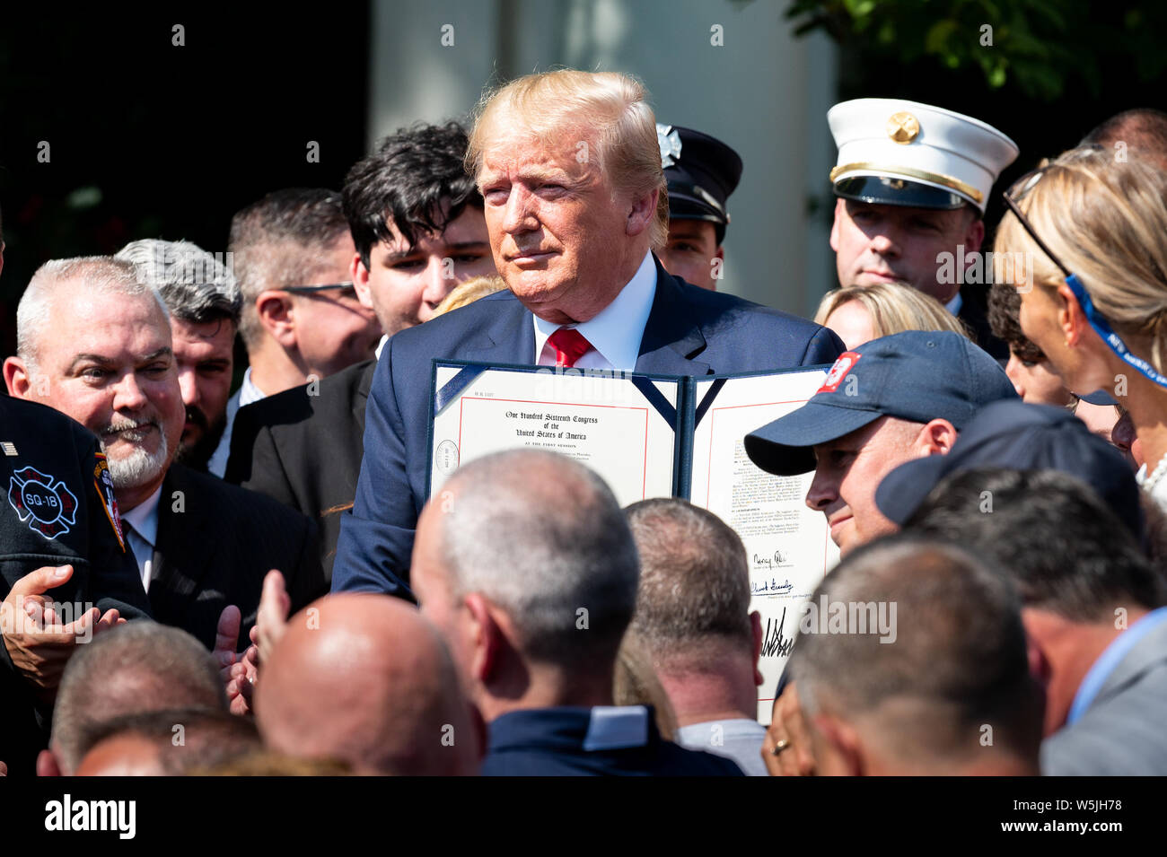 President Donald Trump seen during the bill signing of  H.R.1327 - Never Forget the Heroes: James Zadroga, Ray Pfeifer, and Luis Alvarez Permanent Authorization of the September 11th Victim Compensation Fund Act at the Rose Garden, White House in Washington, DC. Stock Photo