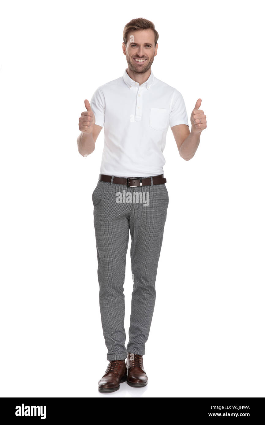 successful young smart casual man makes the ok thumbs up hand sign ...