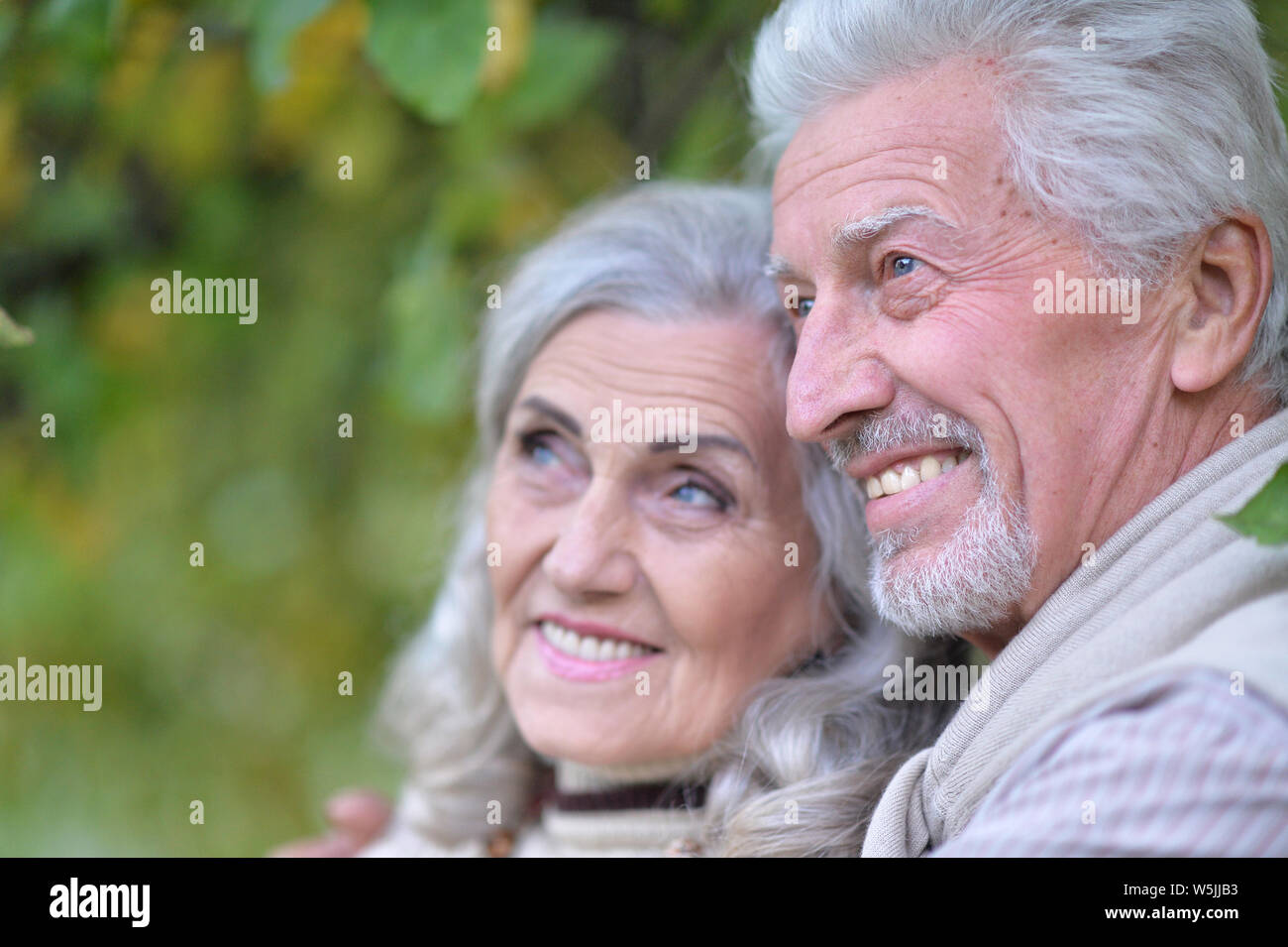 Portrait of beautiful senior couple in the park Stock Photo - Alamy