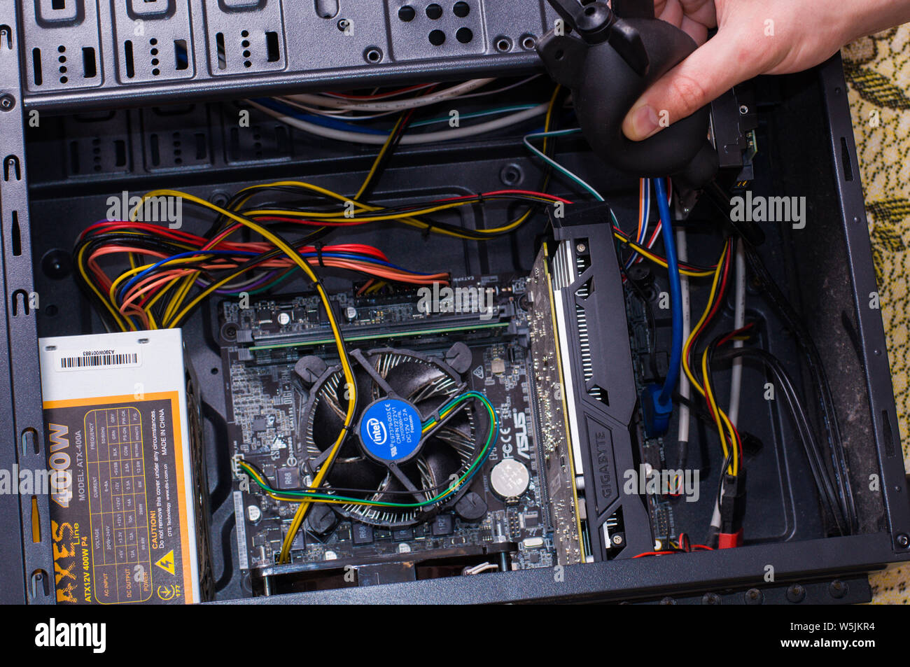 Hand Clean Black Computer Pc With Air Pear Stock Photo Alamy