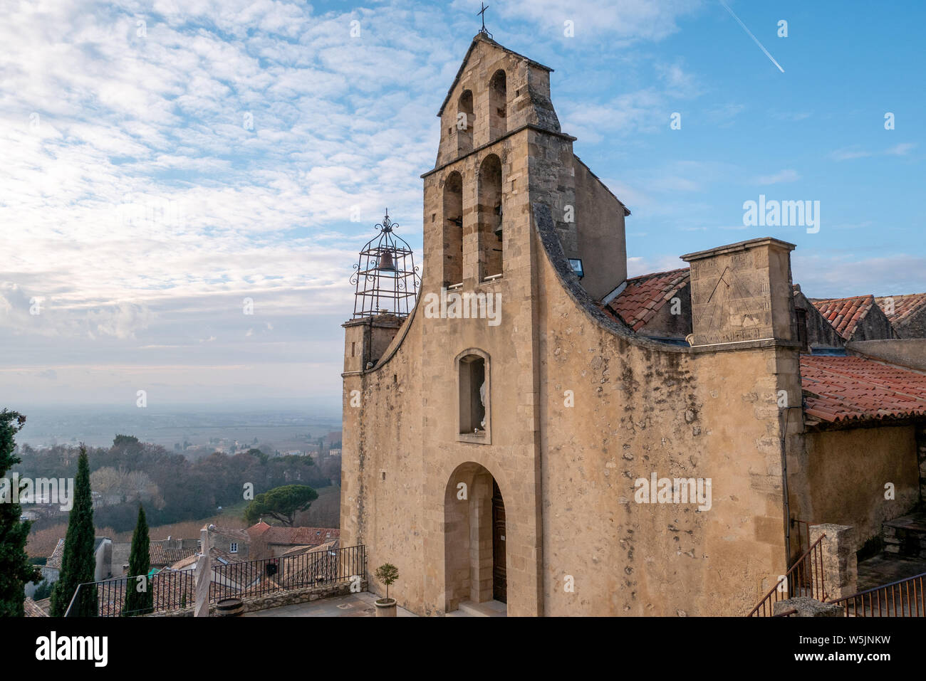 Gigondas, France - January 17, 2019: typical buildings, streets and church of Gigondas, French Rhone wine region. Stock Photo