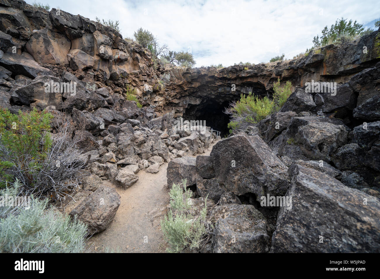 Entrance to the Sentinal Cave in Lava Beds National Monument in California Stock Photo Alamy