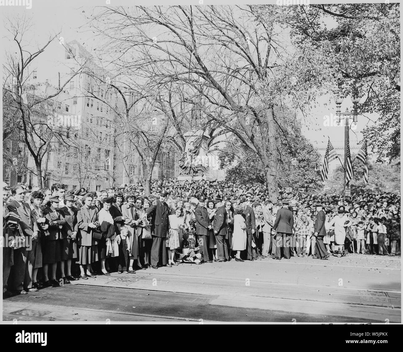 A crowd gathered in Jackson Park, across the street from the front of the White House, waiting to see President Harry S. Truman and Vice President-elect Alben W. Barkley, who had just returned to Washington, DC after their victory in the 1948 election. Stock Photo